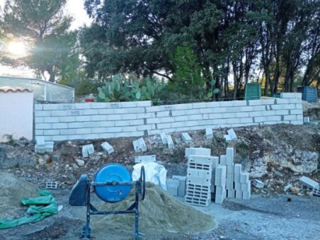 Réalisation de fondation de mur par CP Couverture 